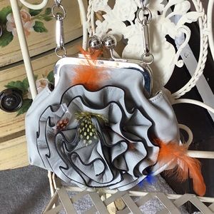 Leather NWOT purse lt gray with removable feathers